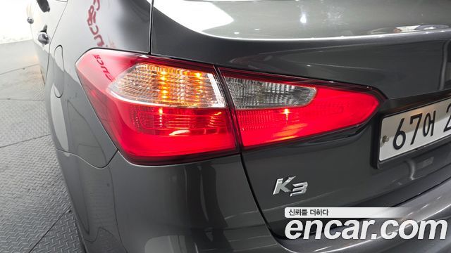 Kia K3 2013 — photo 9