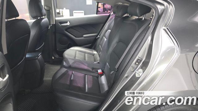 Kia K3 2013 — photo 16