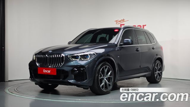 BMW X5 2022 — photo 1