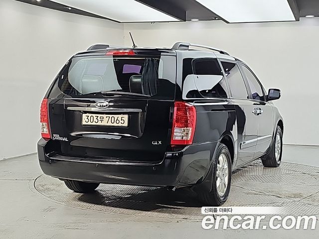 Kia Canival 2012 — photo 4