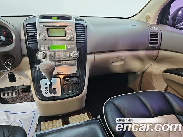 Kia Canival 2012 — photo 10