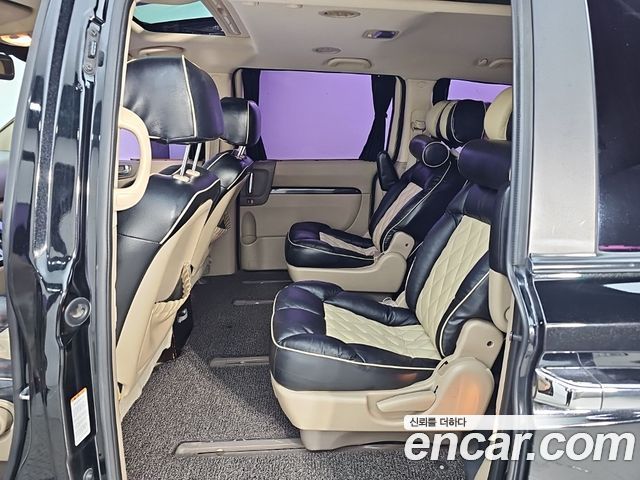 Kia Canival 2012 — photo 12
