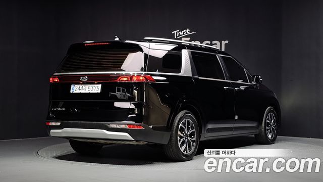 Kia Canival 2021 — photo 2