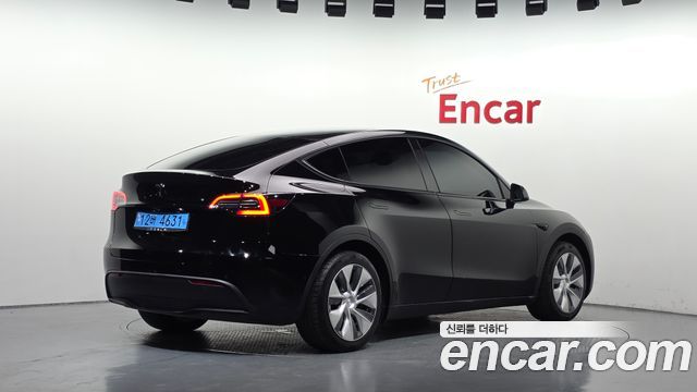 Tesla Model Y 2021 — photo 2