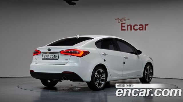 Kia K3 2013 — photo 2