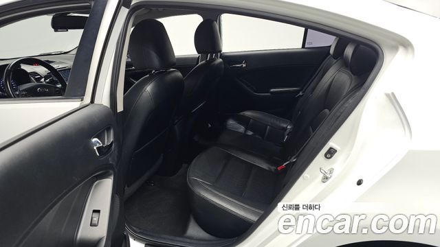 Kia K3 2013 — photo 11