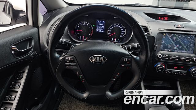 Kia K3 2013 — photo 13