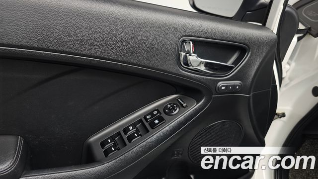 Kia K3 2013 — photo 18