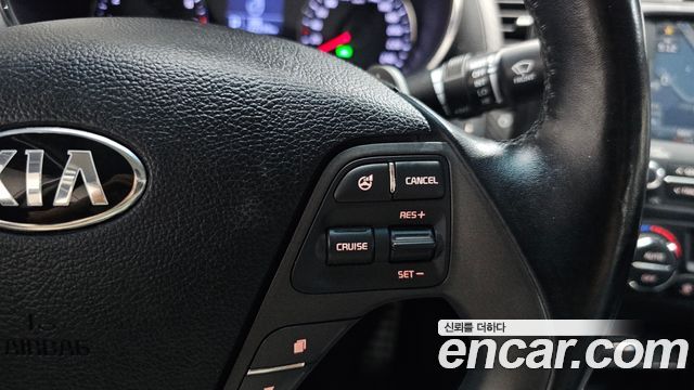 Kia K3 2013 — photo 19