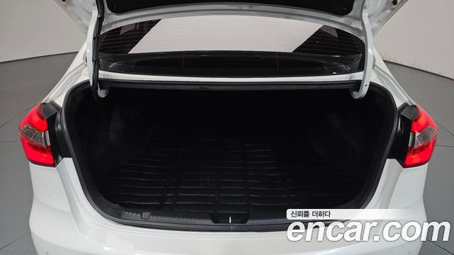 Kia K3 2013 — photo 20