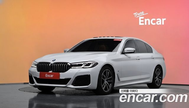 BMW 5-Series 2021 — photo 1