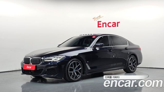BMW 5-Series 2022 — photo 1