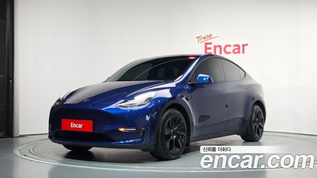 Tesla Model Y 2022 — photo 1