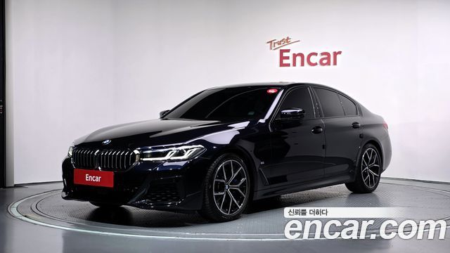 BMW 5-Series 2023 — photo 1