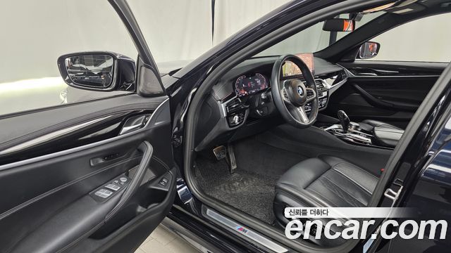 BMW 5-Series 2023 — photo 13
