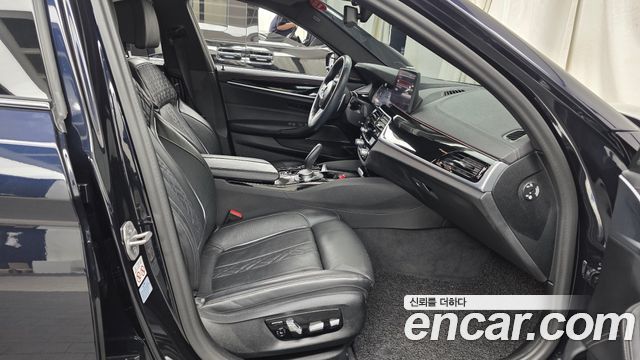 BMW 5-Series 2023 — photo 16