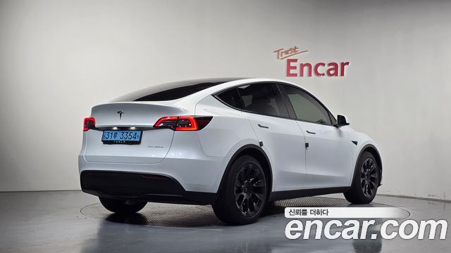 Tesla Model Y 2021 — photo 2