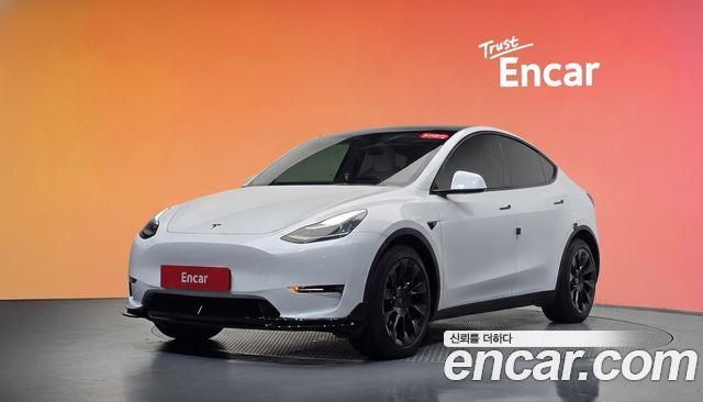 Tesla Model Y 2021 — photo 1