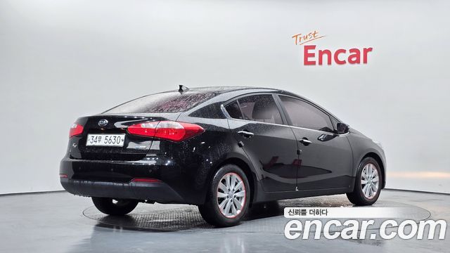 Kia K3 2015 — photo 2