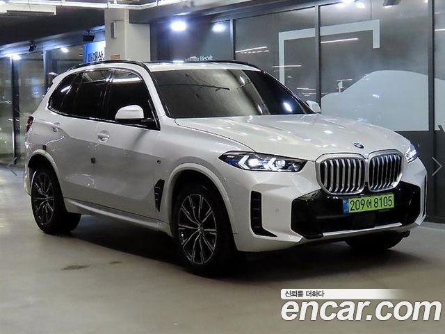BMW X5 2024 — photo 1