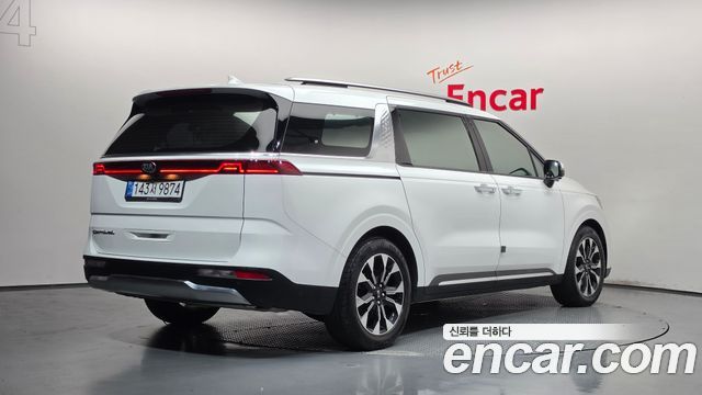 Kia Canival 2021 — photo 2