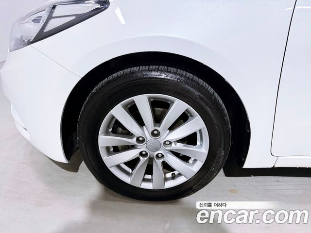 Kia K3 2013 — photo 20