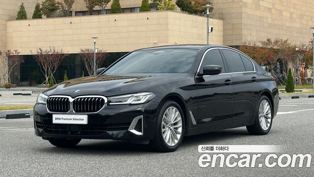 BMW 5-Series 2023 — photo 1