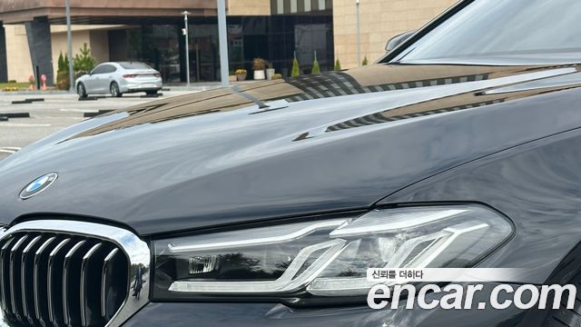 BMW 5-Series 2023 — photo 20