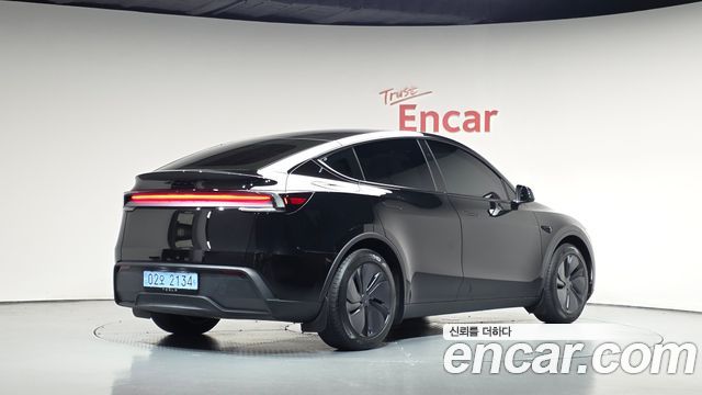 Tesla Model Y 2025 — photo 2