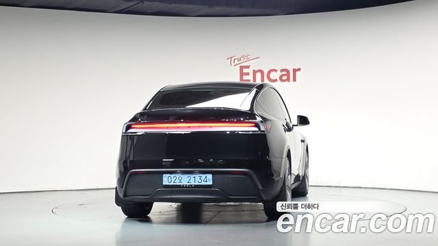 Tesla Model Y 2025 — photo 4