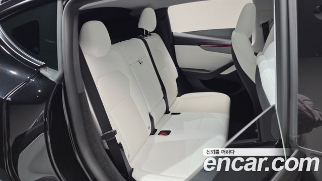 Tesla Model Y 2025 — photo 18