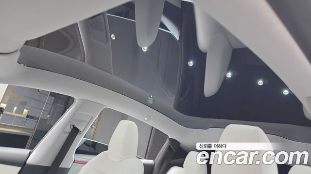 Tesla Model Y 2025 — photo 23