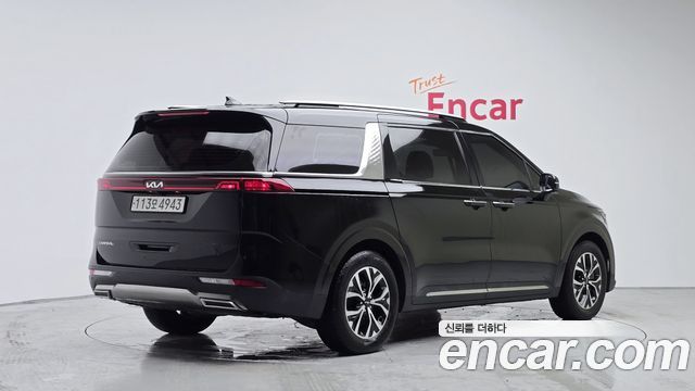 Kia Canival 2023 — photo 2
