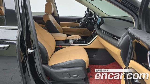 Kia Canival 2023 — photo 11