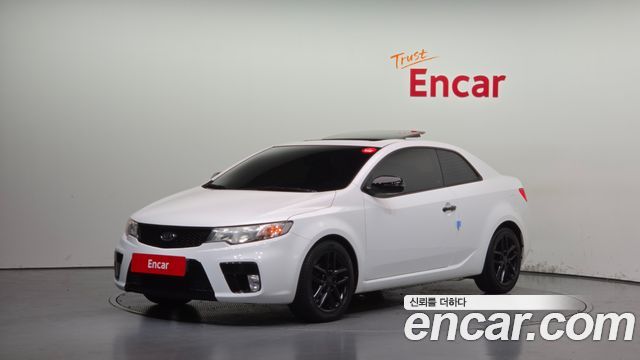 Kia Porte 2012 — photo 1