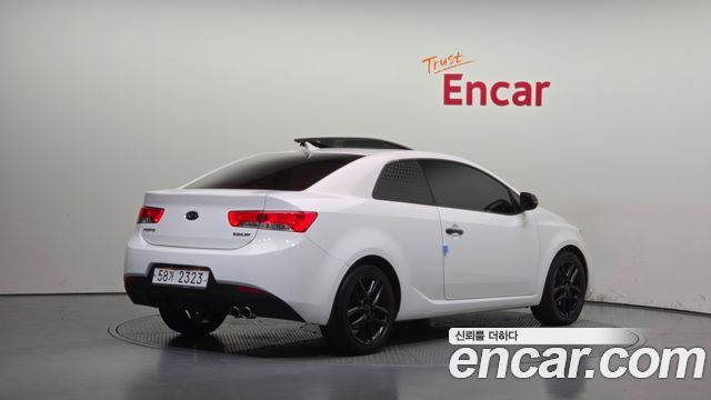 Kia Porte 2012 — photo 2