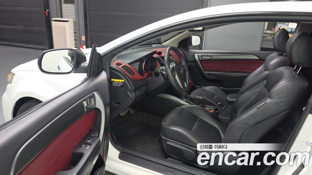Kia Porte 2012 — photo 13