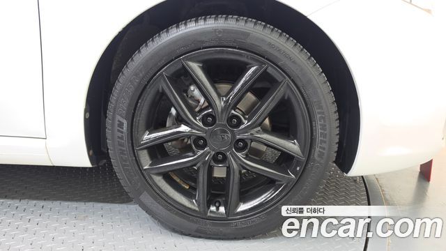 Kia Porte 2012 — photo 7