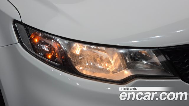 Kia Porte 2012 — photo 8