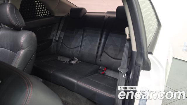 Kia Porte 2012 — photo 16