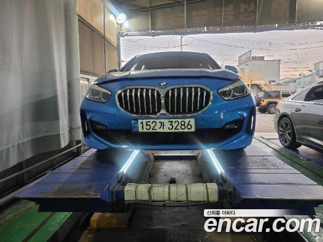 BMW 1-Series 2021 — photo 1