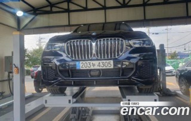 BMW X5 2022 — photo 1