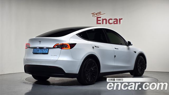 Tesla Model Y 2022 — photo 2
