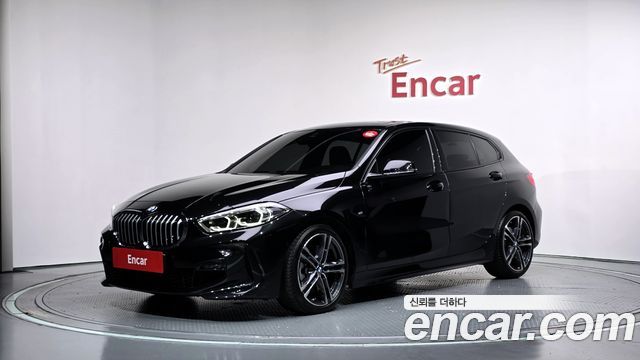 BMW 1-Series 2023 — photo 1