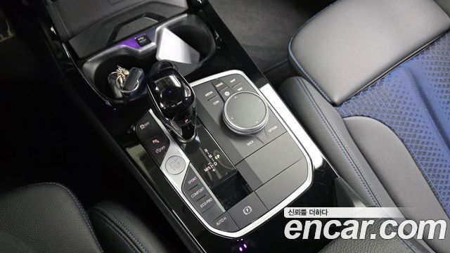 BMW 1-Series 2023 — photo 12