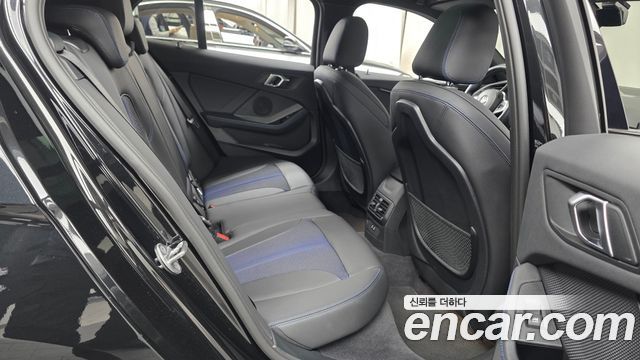 BMW 1-Series 2023 — photo 17