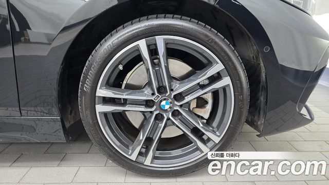 BMW 1-Series 2023 — photo 7