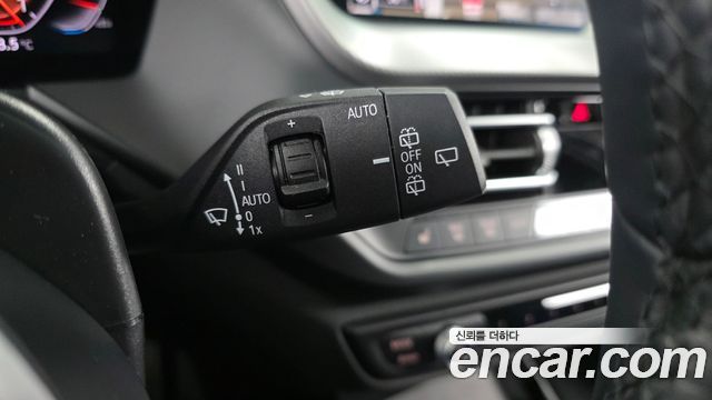 BMW 1-Series 2023 — photo 30