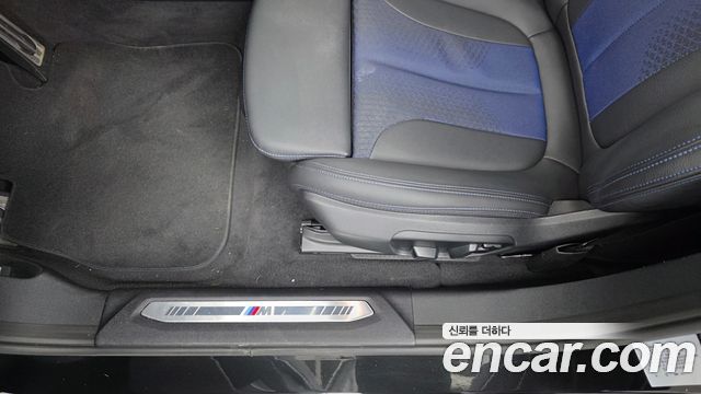 BMW 1-Series 2023 — photo 31