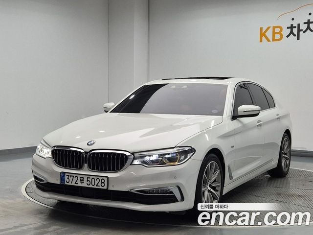 BMW 5-Series 2018 — photo 1